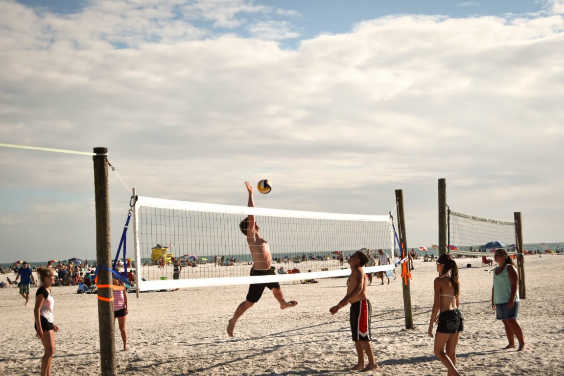 People play volleyball on Siesta Key beach.